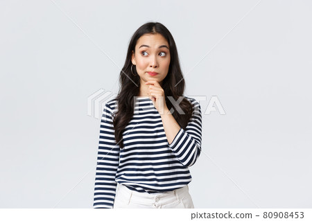 Lifestyle, beauty and fashion, people emotions concept. Thoughtful young asian girl searching for solution, thinking looking away and touching chin while pondering decision Lifestyle, beauty and fashion, people emotions concept. Thoughtful young asian girl searching for solution, thinking looking away and touching chin while pondering decision 80908453