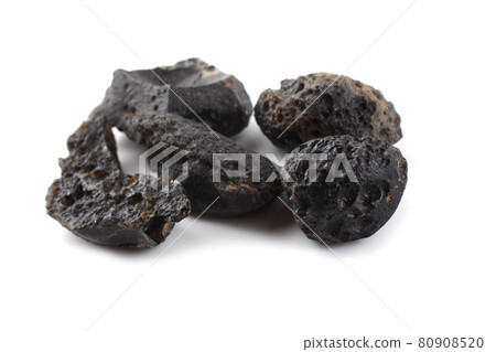 Tektite isolated on white. Meteorite glass Tektite isolated on white. Meteorite glass 80908520