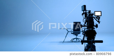 Video production behind the scenes. Making of TV commercial movie that film crew team lightman and cameraman working together with film director in studio. film production concept. Silhouette style. Video production behind the scenes. Making of TV commercial movie that film crew team lightman and cameraman working together with film director in studio. film production concept. Silhouette style. 80908798