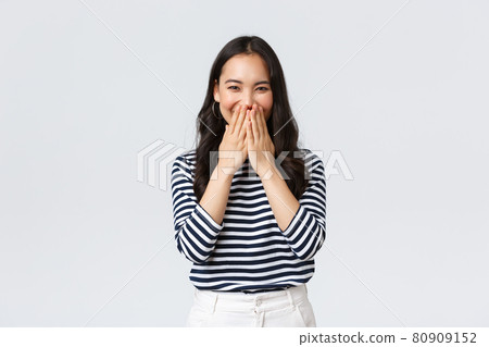 Lifestyle, people emotions and casual concept. Cute silly asian female giggle while gossiping and mocking someone, cover mouth as smiling and laughing carefree Lifestyle, people emotions and casual concept. Cute silly asian female giggle while gossiping and mocking someone, cover mouth as smiling and laughing carefree 80909152