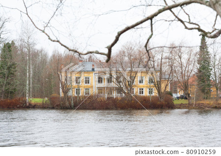 KOUVOLA, FINLAND - NOVEMBER 5, 2018: Beautiful wooden Rabbelugn Manor - Takamaan Kartano in autumn day. Wrede family house was built in 1820 on the river Kymijoki bank 80910259