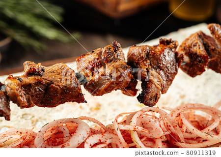 Grilled georgian mutton meat shashlik skewers 80911319