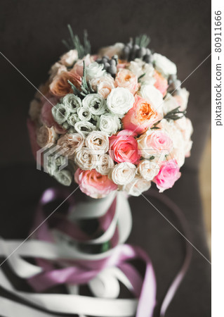 Beautiful wedding bouquet with different flowers, roses Beautiful wedding bouquet with different flowers, roses 80911666