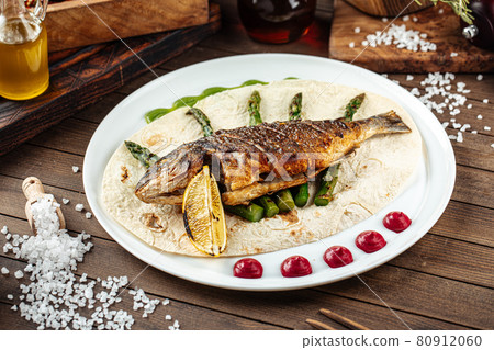 Dish of gourmet grilled dorada fish Dish of gourmet grilled dorada fish 80912060