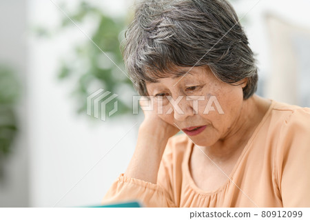 Senior women passbook worried 80912099