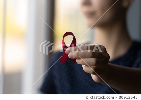 Oncology patient showing breast cancer awareness ribbon Oncology patient showing breast cancer awareness ribbon 80912543
