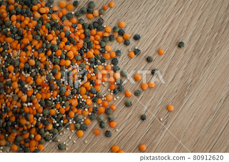 Mixture of legumes, mix of red and black lentil on wooden table. Healthy eating, vegan food Mixture of legumes, mix of red and black lentil on wooden table. Healthy eating, vegan food 80912620