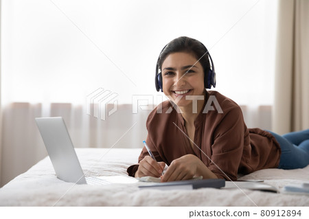 Portrait of smiling Indian woman have webcam training Portrait of smiling Indian woman have webcam training 80912894