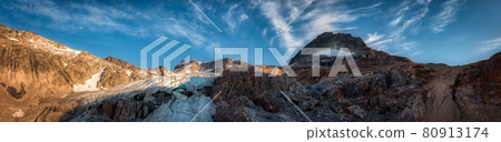 View of Vibrant Colorful Glacier Lake up in Rocky Mountains View of Vibrant Colorful Glacier Lake up in Rocky Mountains 80913174