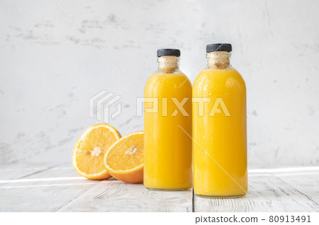 Two bottles of orange juice Two bottles of orange juice 80913491