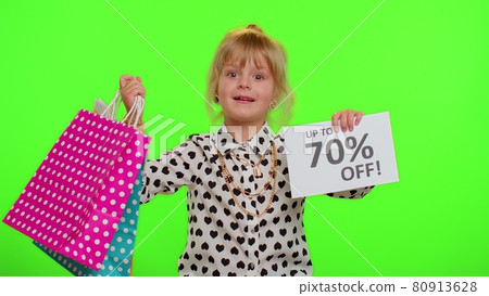 Kid child girl showing shopping bags and Up To 70 Percent Off inscriptions banner text, Black Friday Kid child girl showing shopping bags and Up To 70 Percent Off inscriptions banner text, Black Friday 80913628