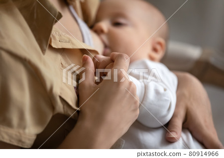 Close up of mom breastfeed baby infant Close up of mom breastfeed baby infant 80914966