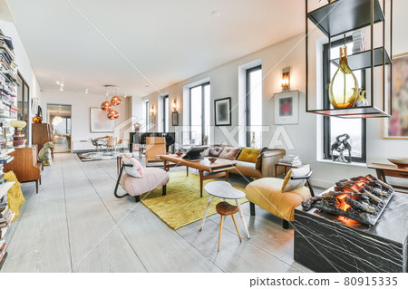 Stylish interior design of living room with elegant furniture and soft comfy couch 80915335