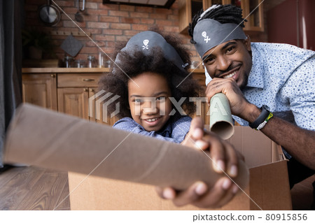 Portrait of happy ethnic dad and daughter play together 80915856