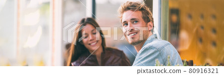 Happy young man with woman friend at cafe city lifestyle students adults banner panoramic header smiling caucasian guy with asian girl Happy young man with woman friend at cafe city lifestyle students adults banner panoramic header smiling caucasian guy with asian girl 80916321
