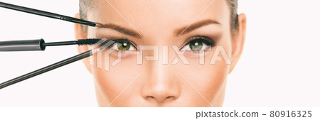 Eye makeup Asian woman professional make up artist applying mascara and eyebrow pencil makeover transformation. Woman putting shadow powder on eyes with makeup brush. Closeup of eyelid and eyebrow Eye makeup Asian woman professional make up artist applying mascara and eyebrow pencil makeover transformation. Woman putting shadow powder on eyes with makeup brush. Closeup of eyelid and eyebrow 80916325