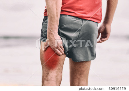 Hamstring pain pulled muscle on back thigh painful red area athlete man massaging sports injury fitness cramp muscles Hamstring pain pulled muscle on back thigh painful red area athlete man massaging sports injury fitness cramp muscles 80916359