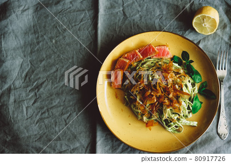 Spinach pasta with tuna fish and bonito flakes 80917726