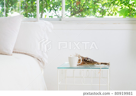 White bed and side table 80919981
