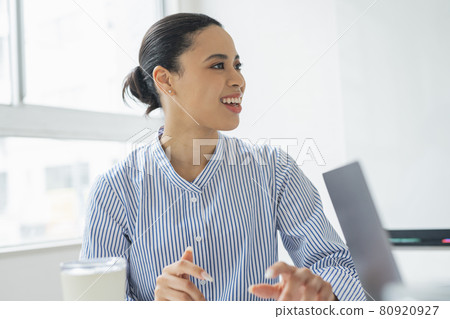 Half-woman attending a meeting Half-woman attending a meeting 80920927