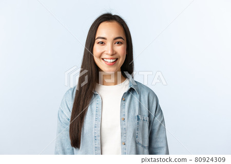 Lifestyle, people emotions and beauty concept. Smiling good-looking asian female student looking camera pleased. Girl in college starting online courses. Woman in casual clothes grinning Lifestyle, people emotions and beauty concept. Smiling good-looking asian female student looking camera pleased. Girl in college starting online courses. Woman in casual clothes grinning 80924309