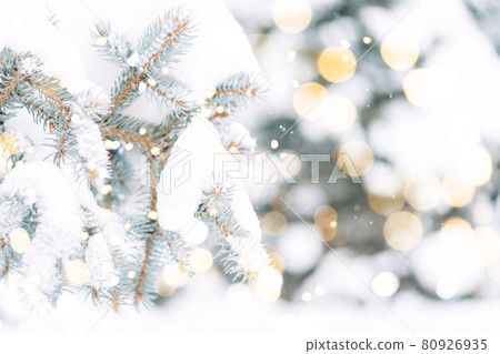 Christmas tree background outdoor with snow, lights bokeh around, and snow falling, Christmas atmosphere Christmas tree background outdoor with snow, lights bokeh around, and snow falling, Christmas atmosphere 80926935