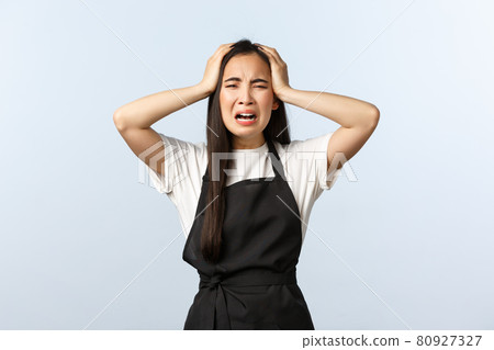 Coffee shop, small business and startup concept. Desperate and distressed young asian girl barista having trouble, panicking, crying and grab head, scared as made big mistake, lost money Coffee shop, small business and startup concept. Desperate and distressed young asian girl barista having trouble, panicking, crying and grab head, scared as made big mistake, lost money 80927327