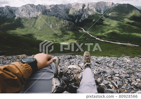 Hiker on high altitude mountain top enjoy the view 80928566