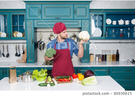 Chef following recipe. Cooking dinner with traditional  80930015