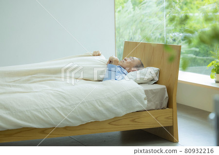 Bedroom senior man 80932216