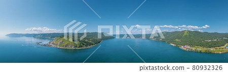 The Angara River in Siberia leaving Lake Baikal near the settlement of Listvyanka. Panoramic aerial view. 80932326