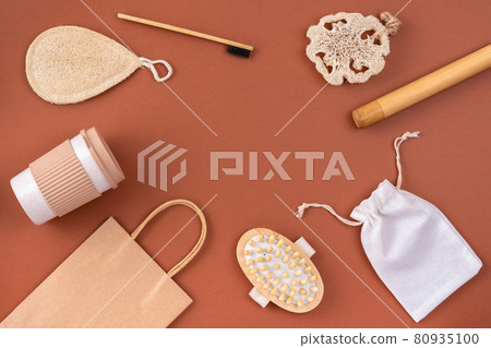 Set of eco friendly bamboo toothbrush, eco bag, reusable coffee mug, wooden comb, loofah sponge. Sustainable lifestyle. 80935100