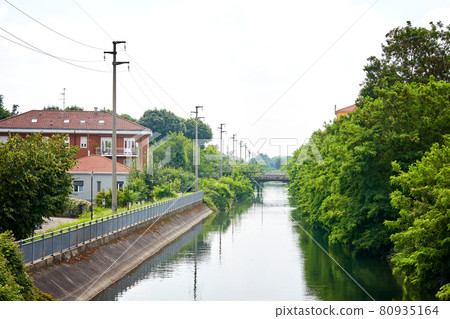 Canale Villoresi. The canal originates from the Ticino river. Garbagnate Milanese 80935164