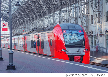 Highspeed train stands by the platform. Highspeed train stands by the platform. 80935344
