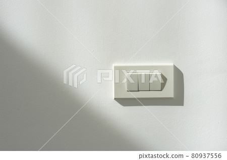 White switch power on a white wall White switch power on a white wall 80937556
