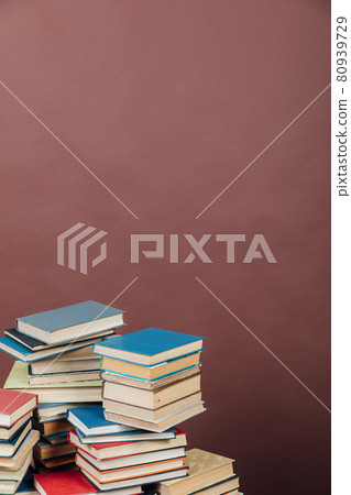 Stacks of books for teaching knowledge university library brown background Stacks of books for teaching knowledge university library brown background 80939729