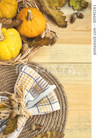 Thanksgiving or autumn table setting 80940161