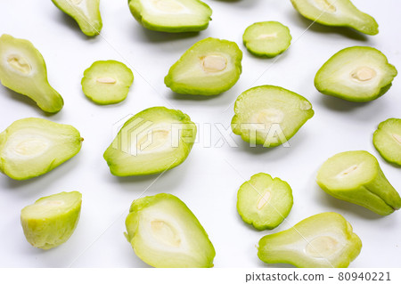 Fresh chayote fruit on white background. Fresh chayote fruit on white background. 80940221