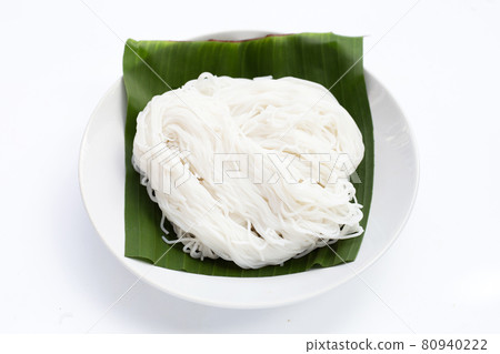 Rice noodle in plate on white background. Rice noodle in plate on white background. 80940222