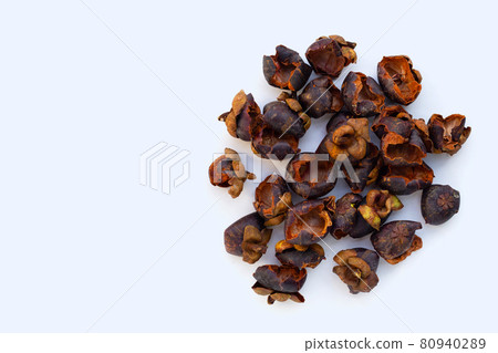 Dried mangosteen peel on white background. Dried mangosteen peel on white background. 80940289