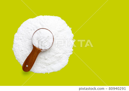 Baking soda on green background. Baking soda on green background. 80940291