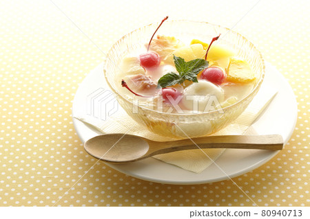 Fruit punch with various fruits and white balls Fruit punch with various fruits and white balls 80940713