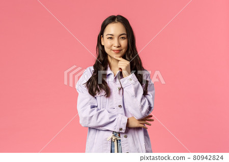 Thoughtful and creative, sassy pretty woman have interesting idea, prepared great plan, smile squinting as made-up great thought, scheming, standing pink background 80942824