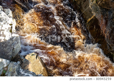 Peaty water streaming down in County Donegal - Ireland Peaty water streaming down in County Donegal - Ireland 80943259