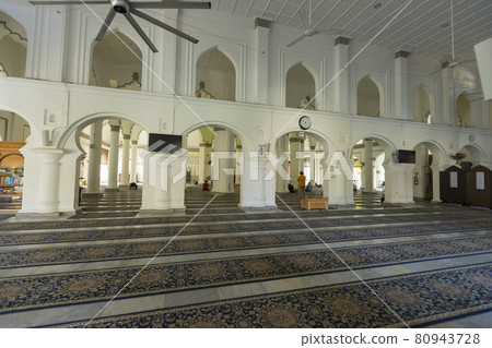 Penang, Malaysia - February 14,2019 : Interior view of Kapitan Keling Mosque in Penang, Malaysia on February 14,2019. Penang, Malaysia - February 14,2019 : Interior view of Kapitan Keling Mosque in Penang, Malaysia on February 14,2019. 80943728