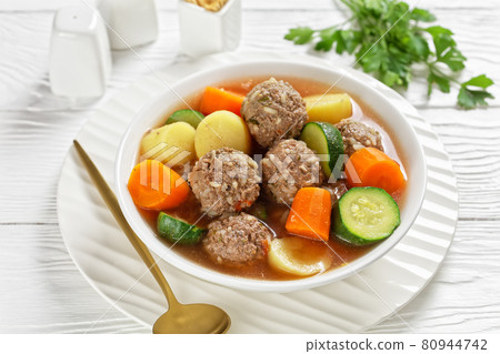 hot mexican meatball vegetable soup, top view 80944742