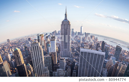 Fisheye aerial view of Manhattan in New York City, USA. Skyline panorama at sunset. Fish eye lens effect 80944774