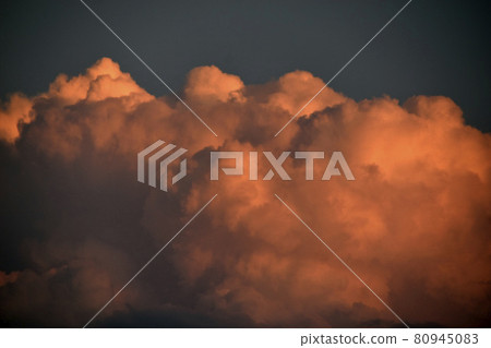 Evening cumulus red and blue clouds over the city Evening cumulus red and blue clouds over the city 80945083