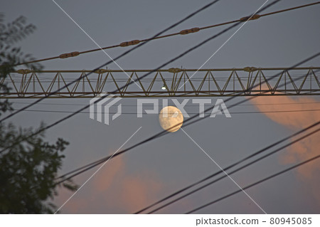 Evening landscape and full moon with a tower crane Evening landscape and full moon with a tower crane 80945085