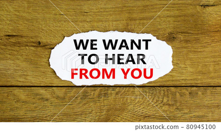 Support symbol. Words 'we want to hear from you' on white paper. Beautiful wooden background. Copy space. Business and support concept. Support symbol. Words 'we want to hear from you' on white paper. Beautiful wooden background. Copy space. Business and support concept. 80945100